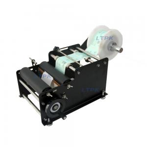 Manual low cost round bottle labeling machine Manual low cost round bottle labeling machine