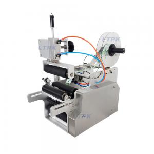 Semi auto pneumatic round bottle labeling machine Semi auto pneumatic round bottle labeling machine